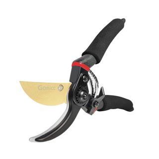 A pair of black and red plant clippers with gold blades