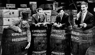 The Marx Brothers in barrels in Monkey Business