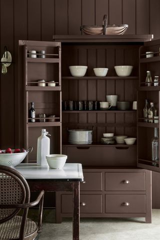 Pantry cabinet painted in brown