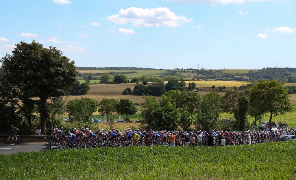 The pack of ruders cycles during the 4th stage of the 109th edition of the Tour de France cycling race 1715 km between Dunkirk and Calais in northern France on July 5 2022 Photo by Thomas SAMSON AFP Photo by THOMAS SAMSONAFP via Getty Images