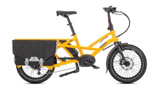 A yellow cargo e-bike