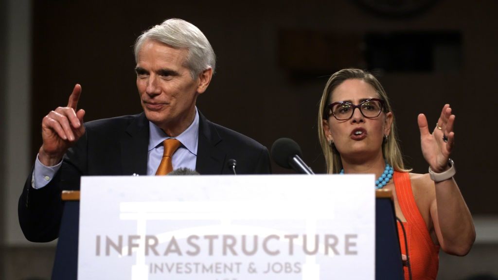 Sen. Rob Portman and Sen. Kyrsten Sinema.