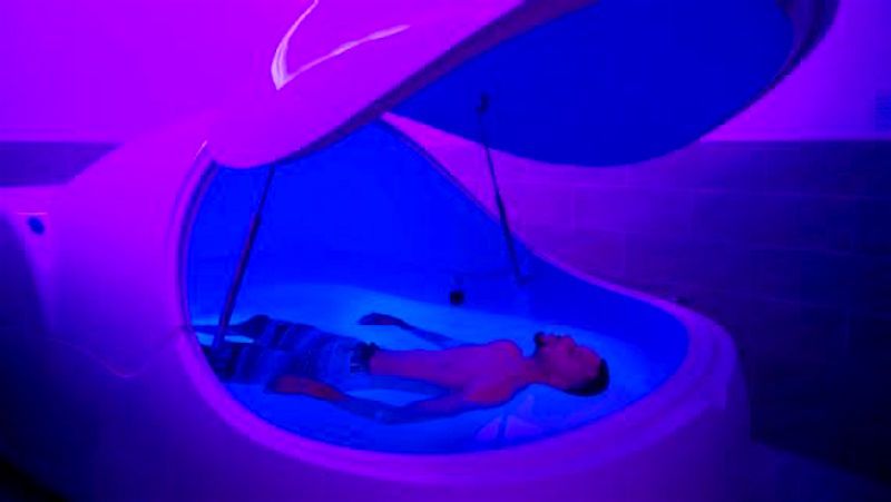 Steph Curry floats in a sensory deprivation pod