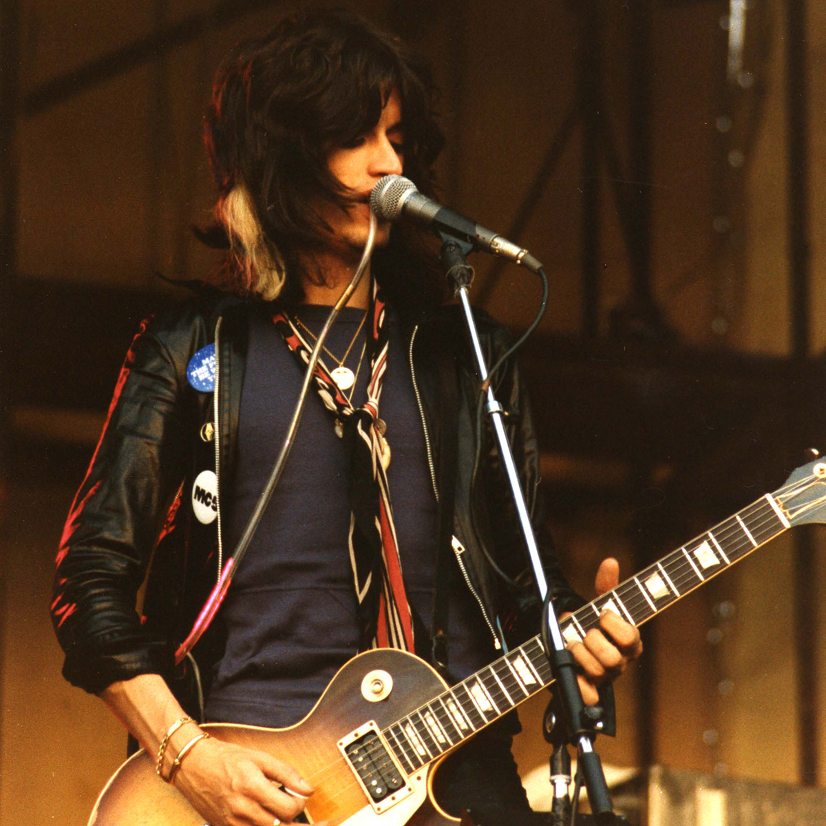 Joe Perry of Aerosmith performs on stage on Day 2 of The Reading Festival on August 27th, 1977 in Reading, United Kingdom. He plays a Gibson Les Paul guitar