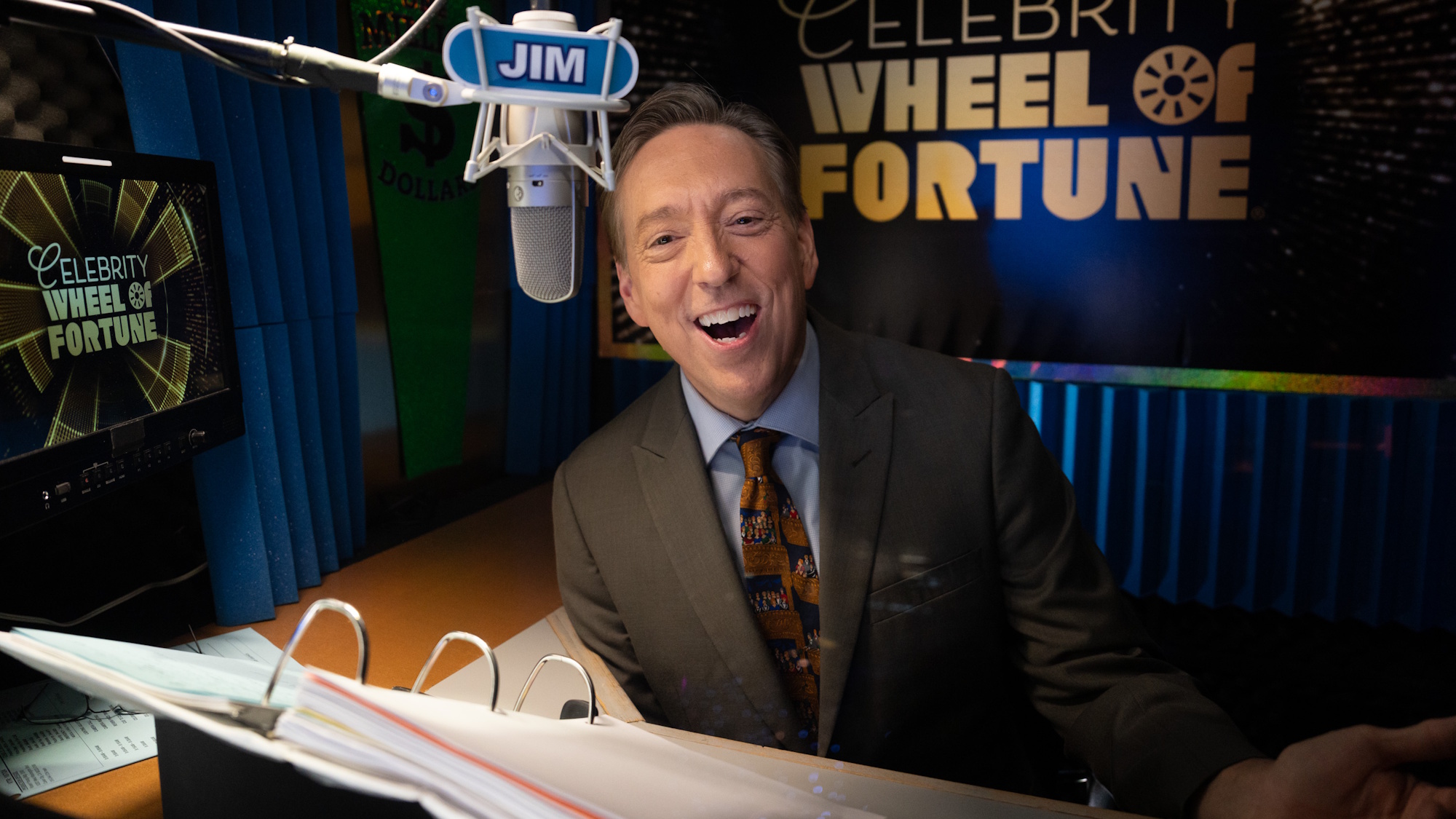 Jim Thornton is shown as the announcer of Celebrity Wheel of Fortune.