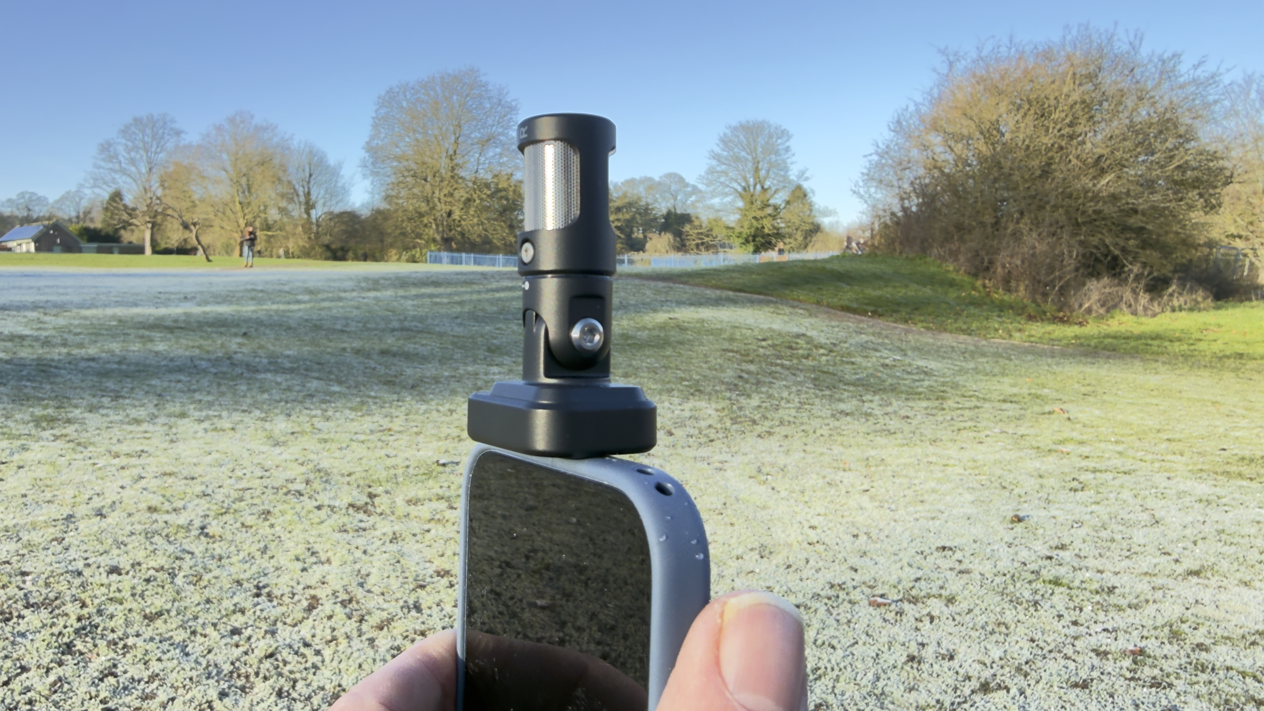 The MV88 plugged into an iPhone 17&amp;rsquo;s USB-C port. The microphone pointing vertically