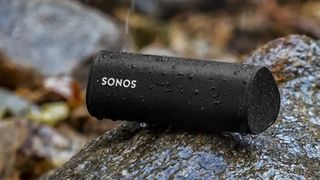 Sonos Roam SL portable speaker getting soaked in the rain
