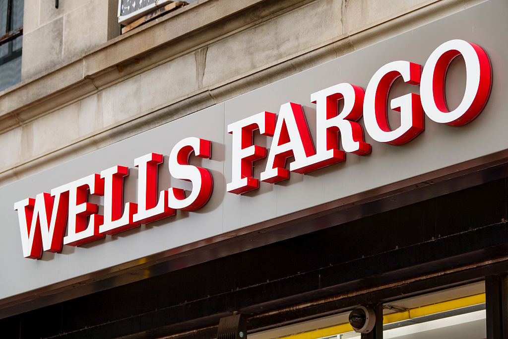 A Wells Fargo logo is displayed on a sign outside of a bank branch on June 6, 2026 in Washington, DC.