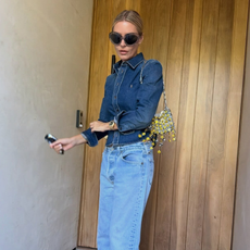 An image of a woman wearing denim shirt outfit 2026
