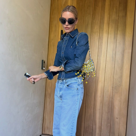 An image of a woman wearing denim shirt outfit 2026