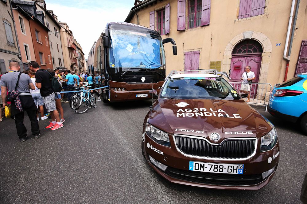 AG2R La Mondiale vehicles at the stage start.