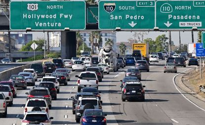 Motorists head north out of downtown Los Angeles, California on November 22, 2022. 