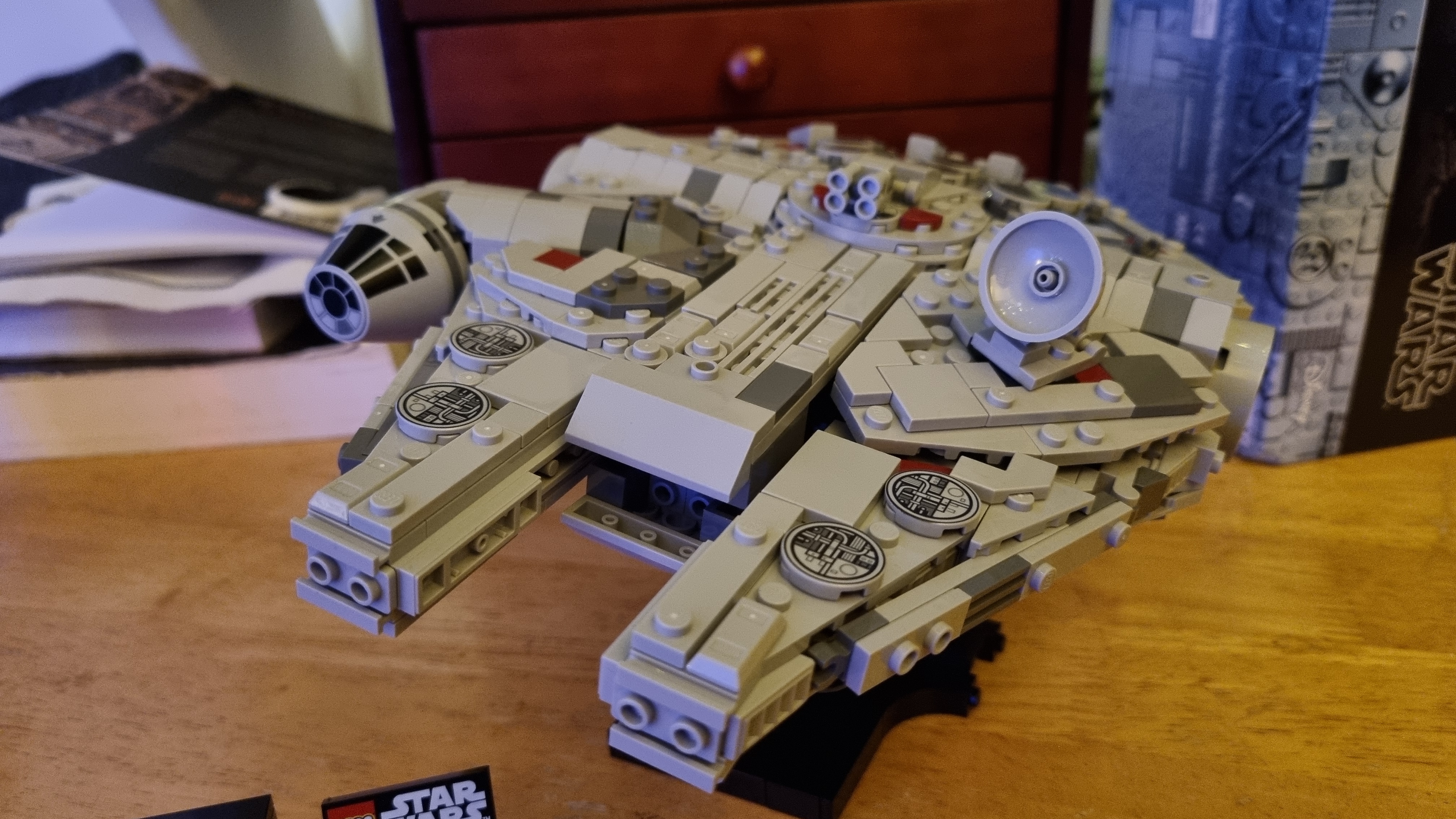 The Lego Millennium Falcon 25th Anniversary Edition in various poses