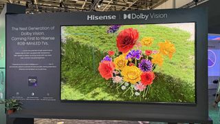 A Hisense TV showing Dolby Vision 2 footage, with the Dolby Vision logo