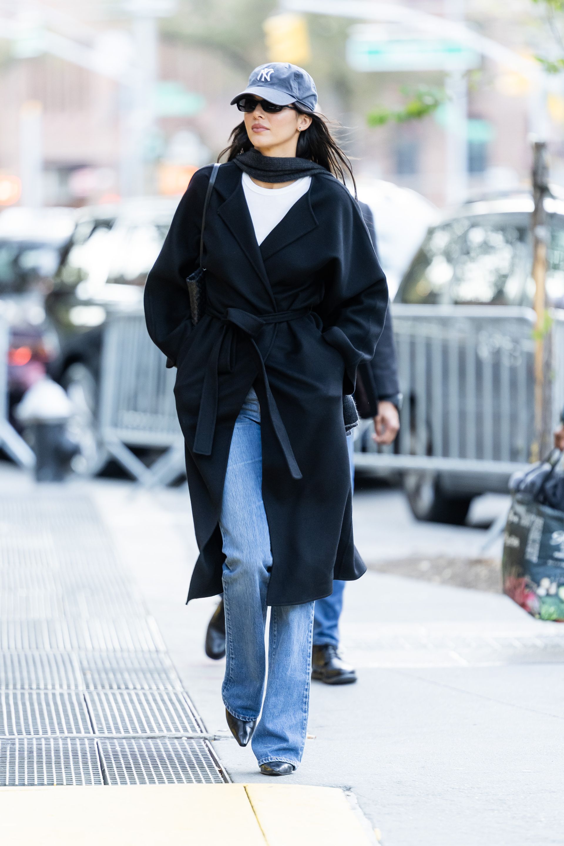 An image of Kendall Jenner wearing bootcut jeans with pointed toe boots while out in New York.
