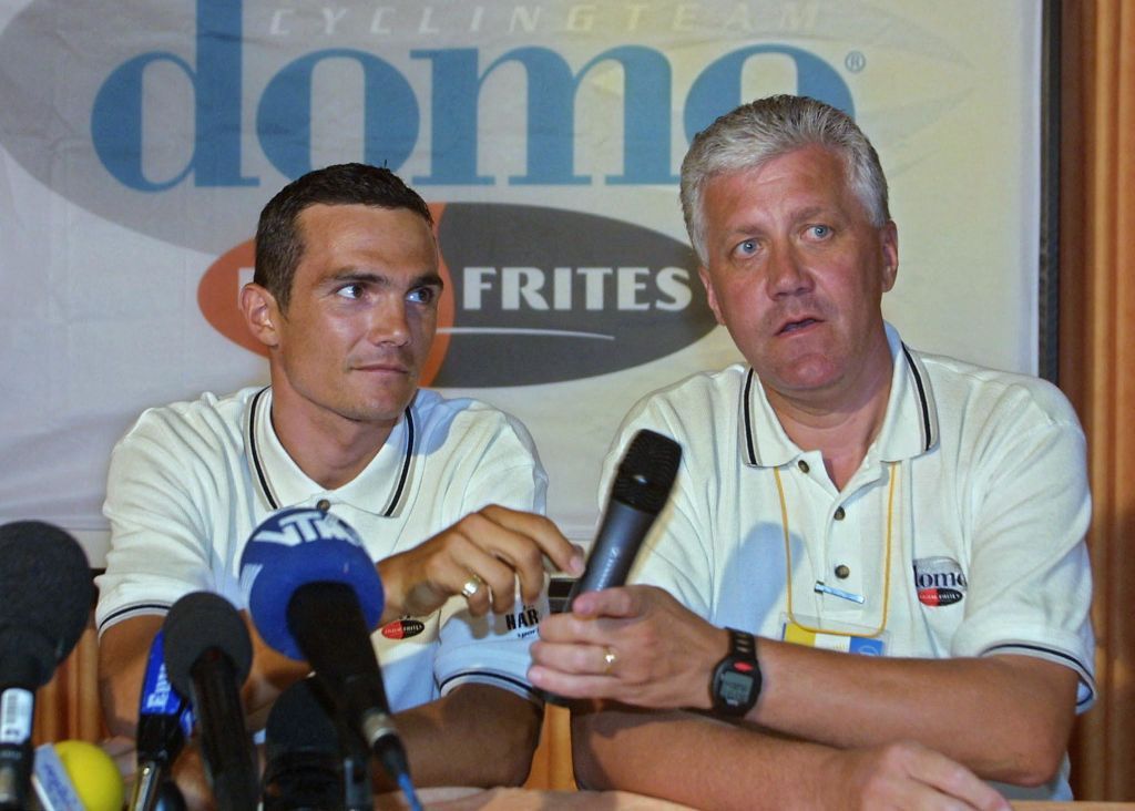 French cyclist Richard Virenque L and Domo team manager Patrick Lefevere speak during a press conference 05 July 2001 in AmbourgtsCappel Richard Virenque has agreed a deal to ride for Belgian outfit Domo FarmFrites when his doping ban ends next month AFP PHOTO FRANCK FIFE Photo by FRANCK FIFE AFP Photo by FRANCK FIFEAFP via Getty Images