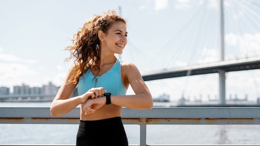 a woman running without headphones