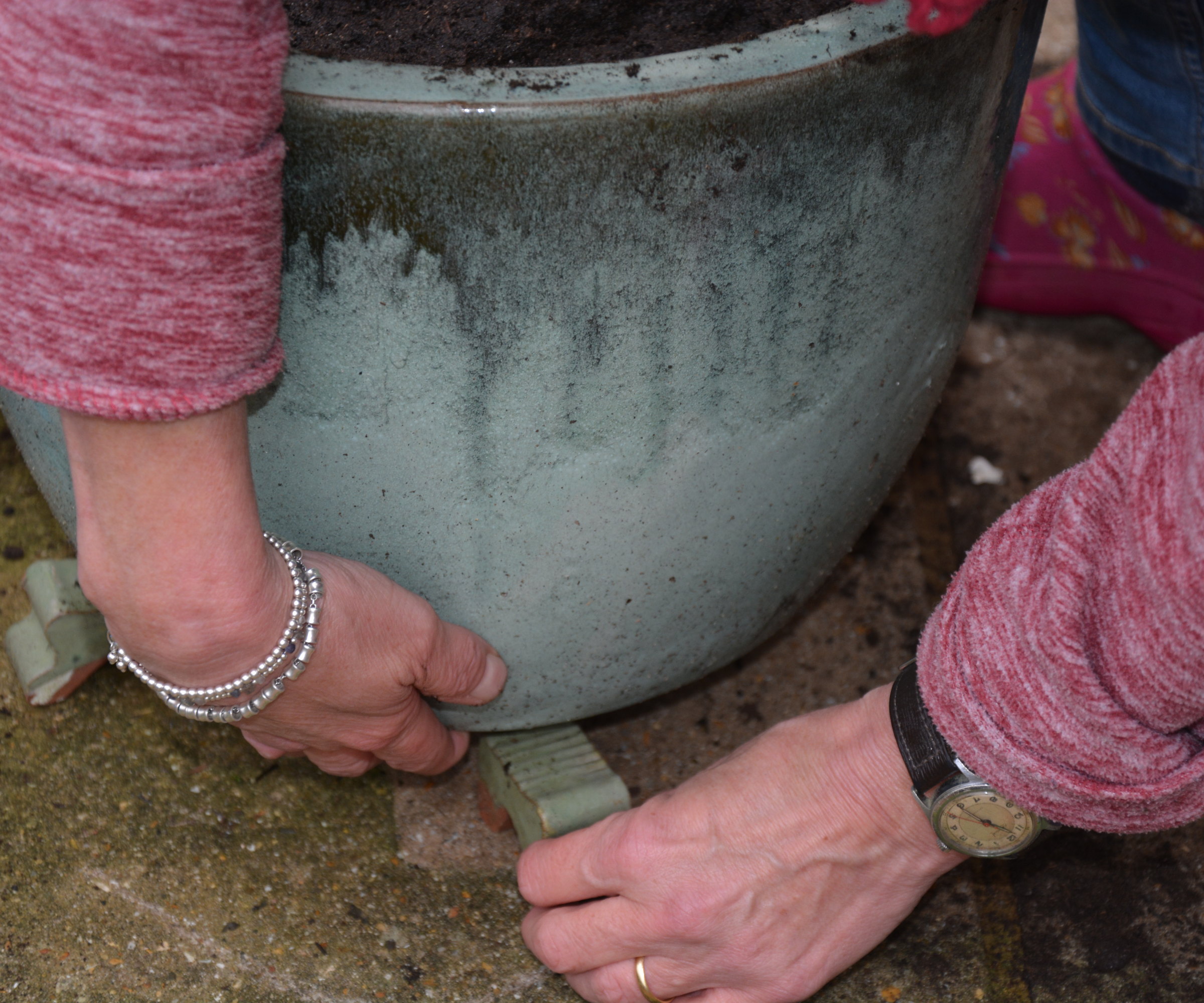 Putting feet under pots to raise them off the ground