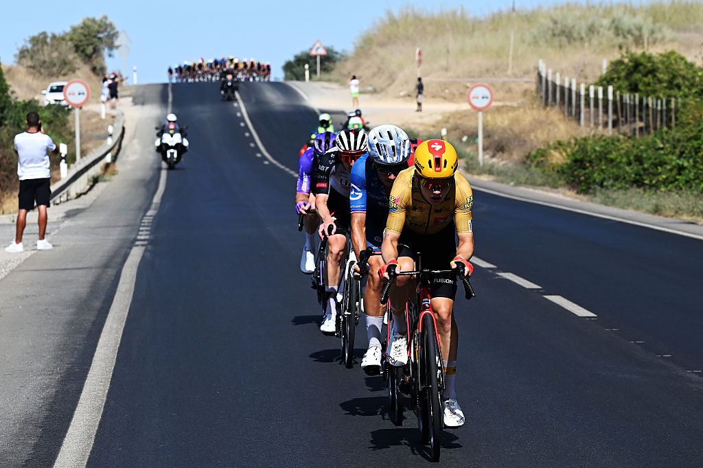 PALOS DE LA FRONTERA, SPAIN - SEPTEMBER 08: (L-R) Valentin Madouas of France and Team Groupama - FDJ United, Simon Dalby of Denmark and Team Uno-X Mobility compete in the breakaway during the La Vuelta - 81st Tour of Spain 2026, Stage 16 a 181.1km stage from Cortegana to Monasterio de La Rabida - Palos de la Frontera / #UCIWT / on September 08, 2026 in Palos de la Frontera, Spain. (Photo by Tim de Waele/Getty Images)