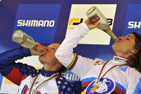 Compton and Vos enjoy the champagne