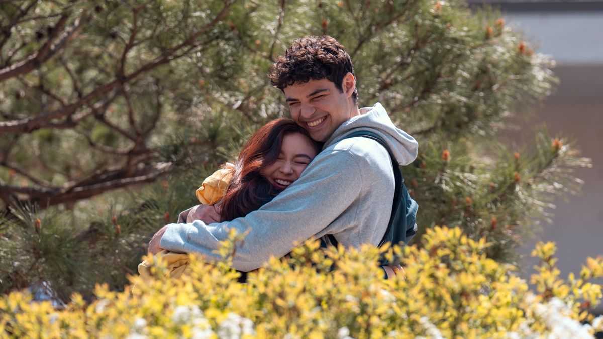 Kitty Song Covey (Anna Cathcart) and Peter Kavinsky (Noah Centineo) hug in Netflix&#039;s &quot;XO, Kitty&quot; season 2