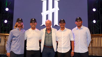 Iron Heads GC team members pose for a picture with LIV Golf CEO Greg Norman