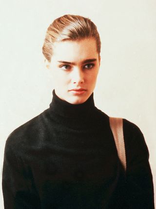 Brooke Shields 1980's portrait wearing black rollneck sweater