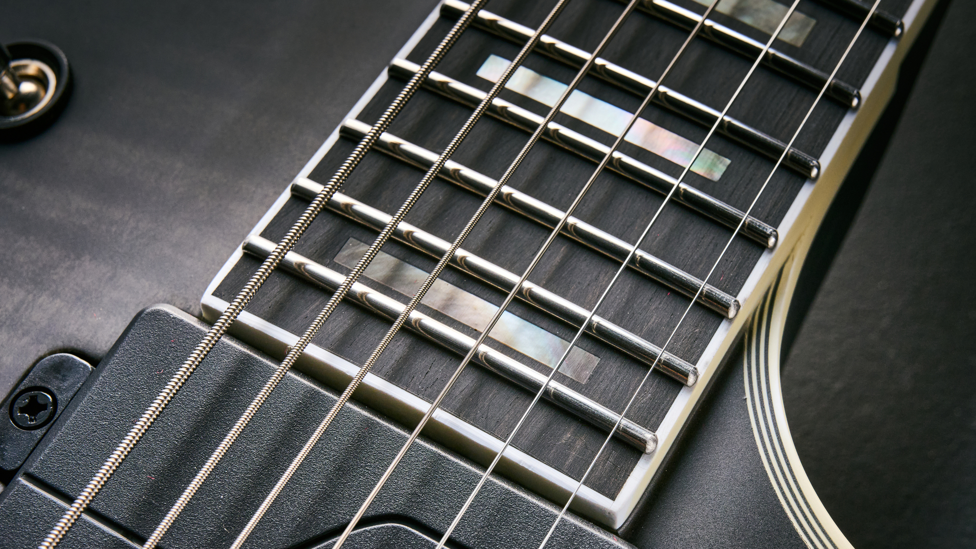 Close up of the fretboard inlays on the Epiphone Prophecy Les Paul Baritone