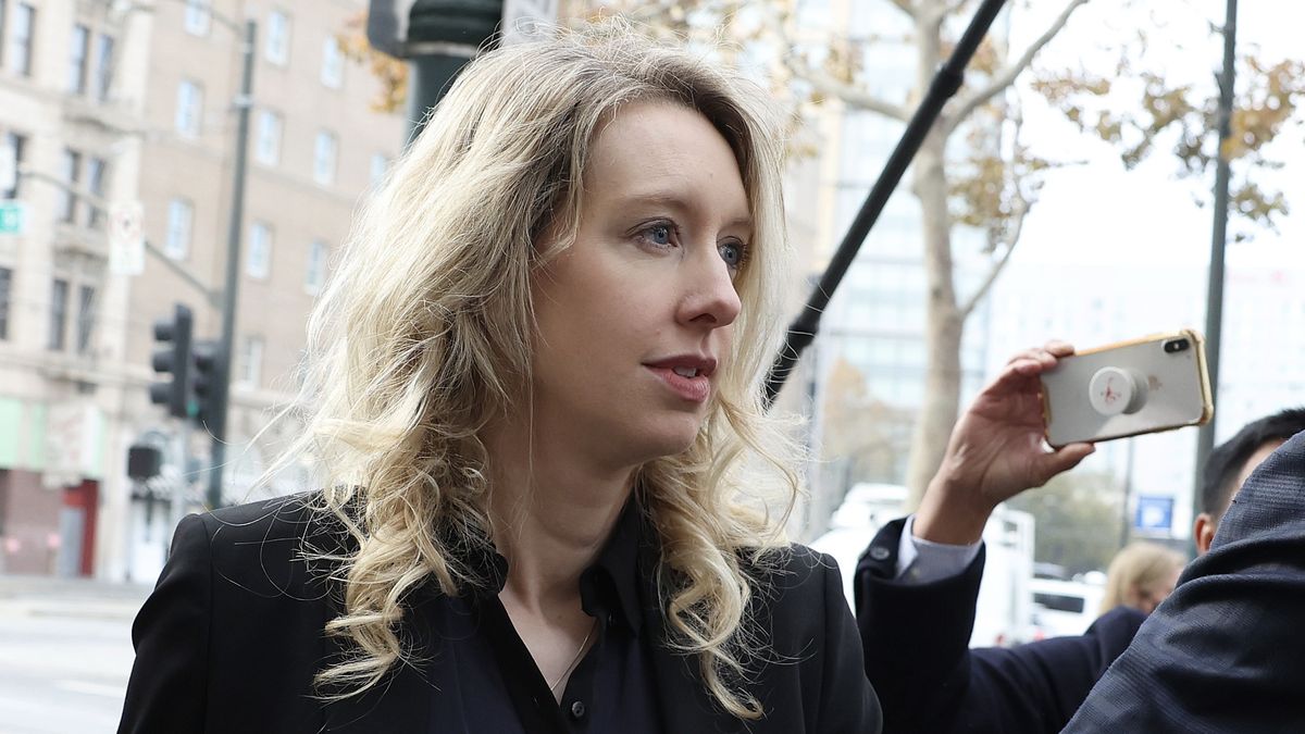 Close-up profile photograph of Elizabeth Holmes