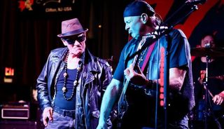 Franché Coma (right) performs onstage