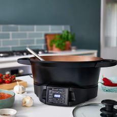 Image of Russell Hobbs multi cooker on countertop in press image 