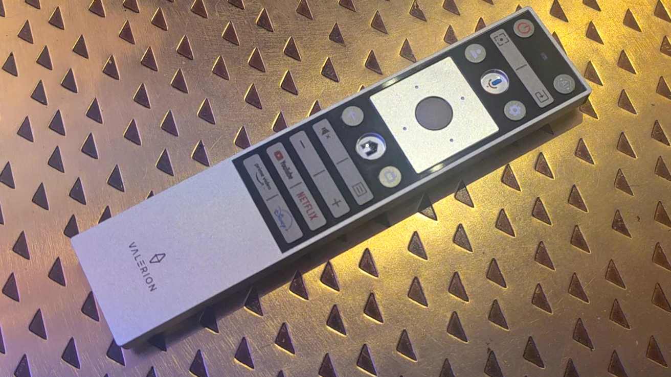 The Valerion VisionMaster 2 Pro's remote, on a table.