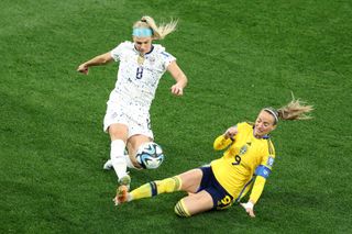 Julie Ertz tacking Asllani