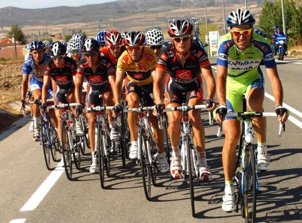 Ivan Basso (Liquigas) rides at the front ahead of the Caisse d'Epargne squad.