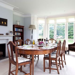 dining room with table and floor lamp