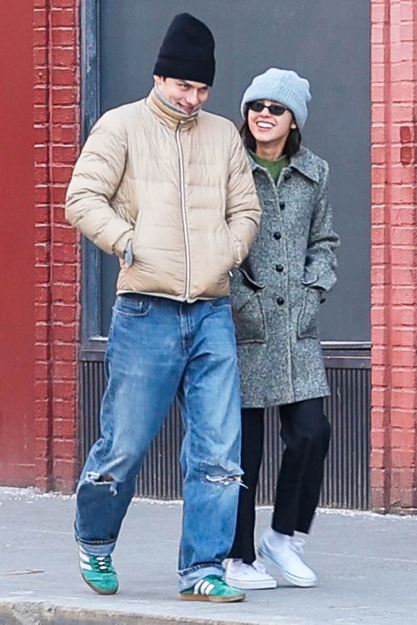 Olivia Rodrigo and Louis Partridge walking in NYC