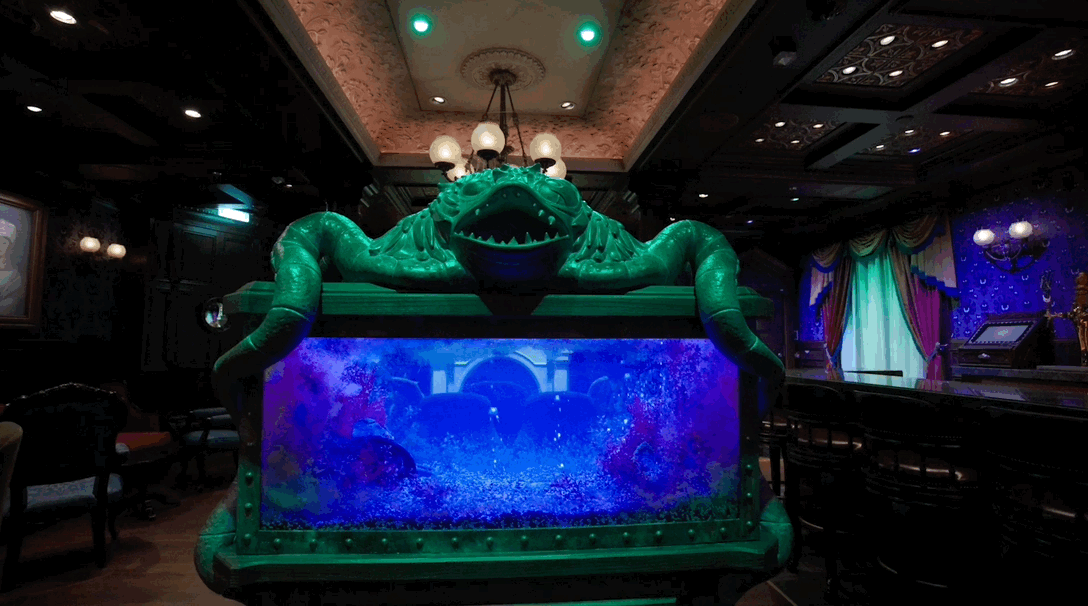 A look at the Ghost Fish Aquarium in the Haunted Mansion Parlor on the Disney Treasure.