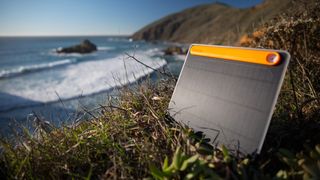 Solar charger on coastal cliff