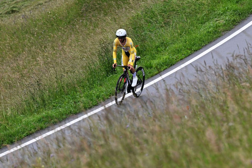 VILLARSSUROLLON SWITZERLAND JUNE 16 Adam Yates of The United Kingdom and UAE Team Emirates Yellow leader jersey sprints during the 87th Tour de Suisse 2024 Stage 8 a 157km individual time trial stage from Aigle to VillarssurOllon 1249m UCIWT on June 16 2024 in VillarssurOllon Switzerland Photo by Tim de WaeleGetty Images