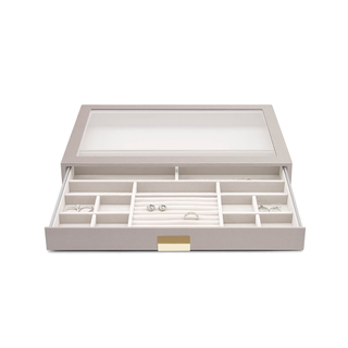 A taupe glass top jewelry box drawer