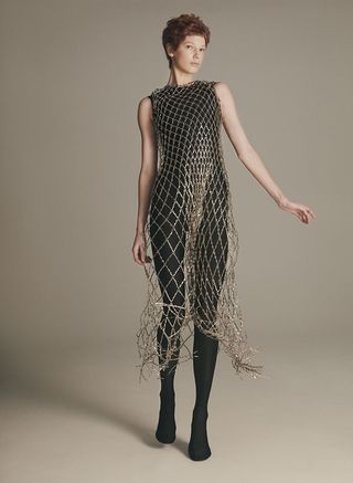 Party dresses in gold chainmail by Balenciaga