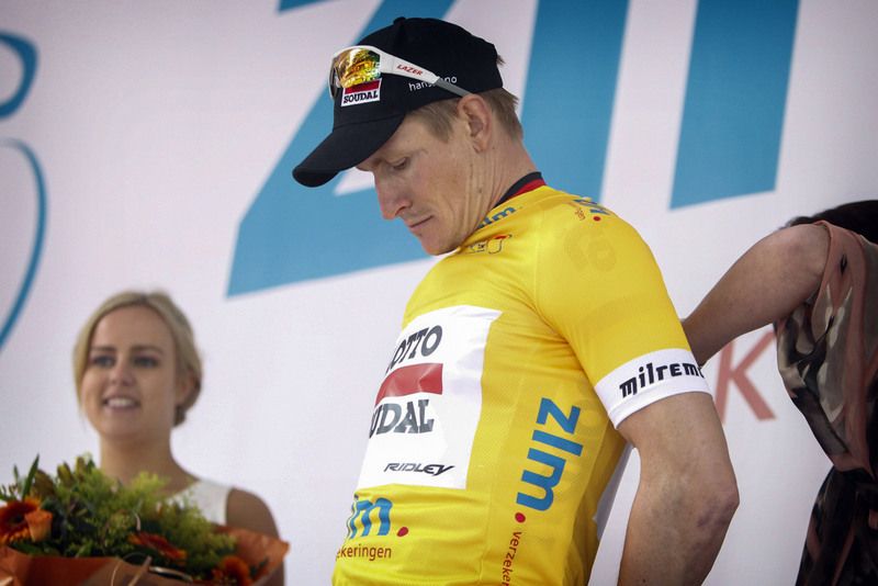 Andr&eacute; Greipel checks out the race leader's jersey