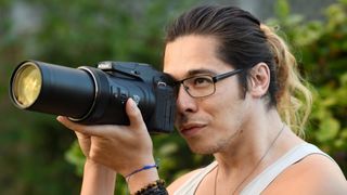 DCW Editor James Artaius using the Nikon Coolpix P1000 zoom camera