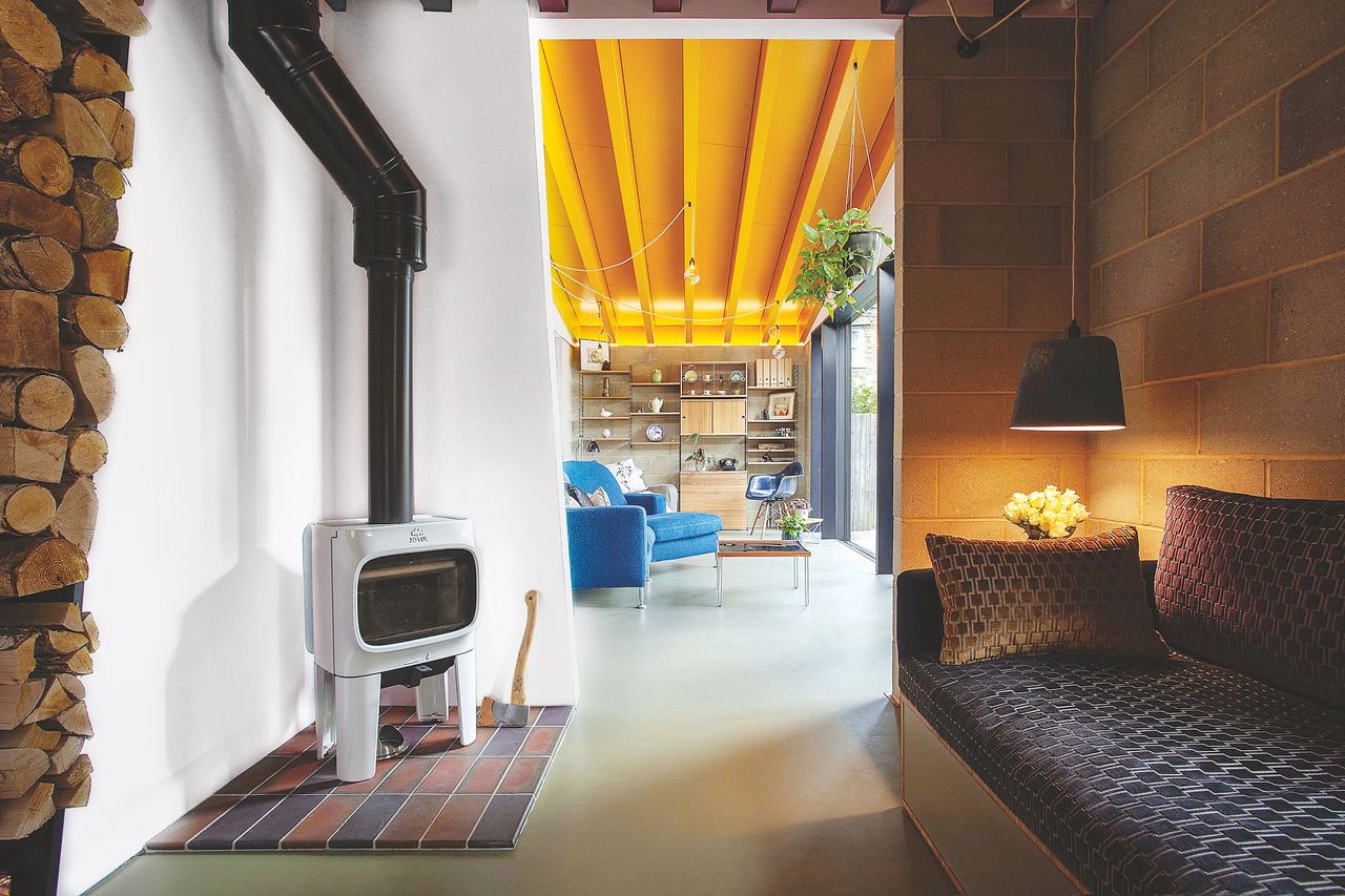 modern living room with small woodburning stove