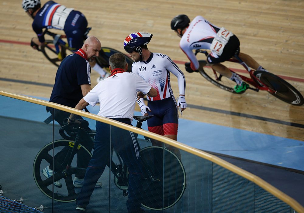 Mark Cavendish gets checked out after crashing in the Madison