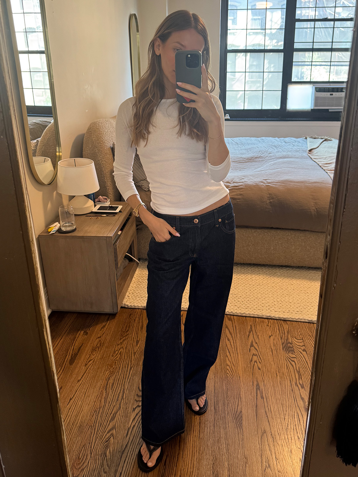 Nikki wears a white tee and Gap loose jeans.