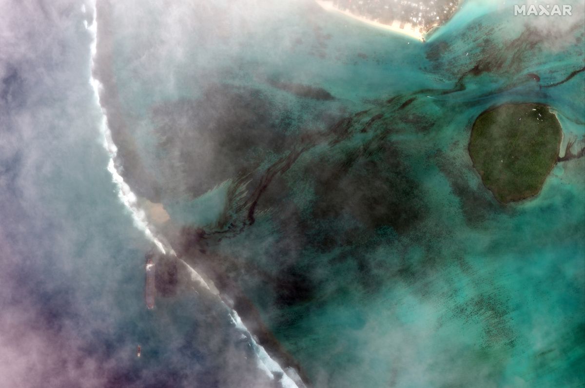 A bulk carrier ship, MV Wakashio, that recently ran aground off the southeast coast of Mauritius has been spilling oil into the sea, as seen in satellite images captured by Maxar Technologies on Aug. 7, 2020.