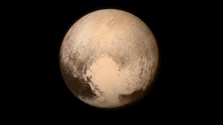 Pluto’s huge white ‘heart’ has a surprisingly violent origin, new study suggests