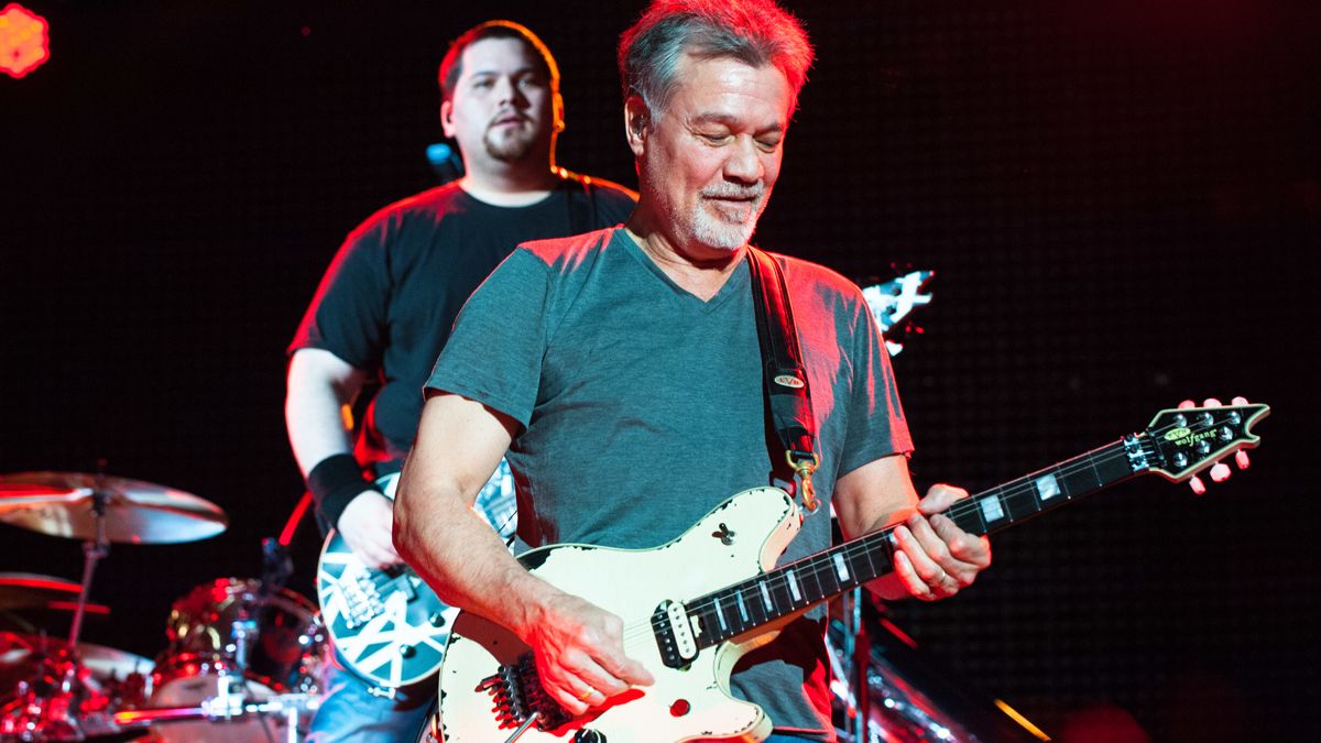 Bassist Wolfgang and Guitarist Eddie Van Halen of Van Halen perform at Perfect Vodka Amphitheatre in West Palm Beach, FL