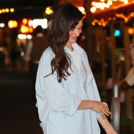 Anne Hathaway walking at night in NYC